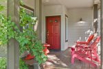 Hang out on the covered porch and take in the quiet neighborhood