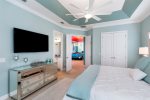 This bedroom has a 65 inch SMART TV 