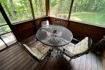 Enjoy dinner on the screened in porch