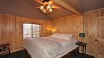 The Bedroom features a luxurious queen bed