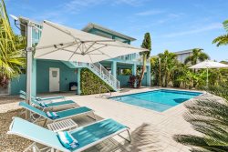 La Casa Iguana - Luxury Canal Front Home w/ Private Pool, 70' of Dockage, Bait Freezer & Ice Machine