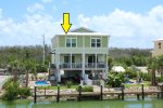 View of Home from Across the Canal with Arrow on Half Duplex