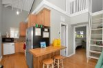 Full kitchen area with bar seating
