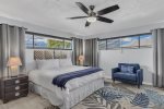 Master king bedroom with twin trundle and bedside chair