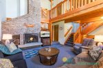 Wood fireplace brings a cozy touch into the living room.