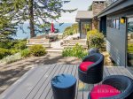 Outside the bedroom is a deck with seating the perfect place to enjoy a morning coffee.