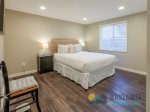 The third bedroom has a queen bed.