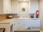 The kitchenette is equipped with a coffee maker.