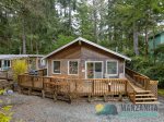 Nestled in the trees, you can relax on the front deck, with a propane BBQ and outdoor seating.