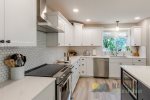 High-end appliances in this fully stocked kitchen.