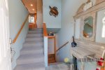 Head downstairs to the remaining rooms in the house. Please note the use of stairs is required.
