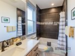 Main level bathroom with a shower/tub.