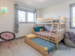 The 4th bedroom is the kid`s room has a twin/full bunk bed with a twin trundle.