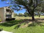 Looking back at Hale Hau`oli end unit with view of golf course