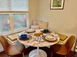 Inside dining nook with bench seating