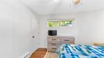 This bedroom also has a T.V.