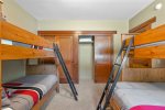 Three twins and one double bed. 