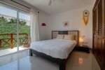 Guest suite with queen bed, private balcony and en suite bathroom