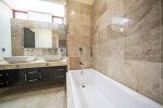 Master suite bathroom with tub