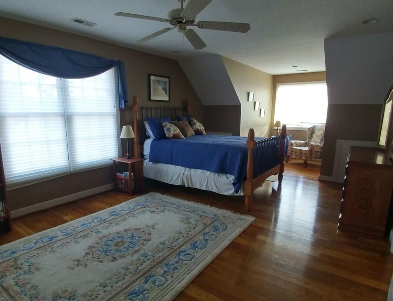 Lake Haven waterfront home with sandy beach and dock perfect for your