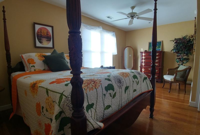 Lake Haven waterfront home with sandy beach and dock perfect for your