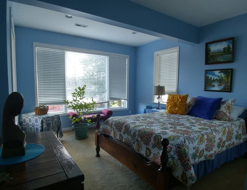 Lake Haven waterfront home with sandy beach and dock perfect for your