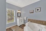 Large shared hall bath with soaking tub and shower