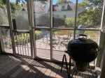 BBQ Charcoal Grill stored in screened porch