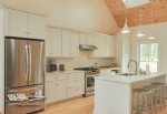 another view of kitchen area with island