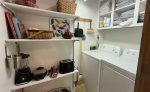 Walk in laundry room and storage