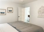 King bedroom leads into a smaller twin bedroom