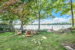 Step out the lower level onto the patio with picnic table and great views of Hutchins Lake