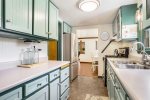 This galley kitchen has plenty of storage and workspace 