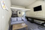 Game room with Smart TV, pop-a-shot, darts, and tabletop shuffleboard