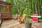 Magical outside area with hot tub, outdoor dining, BBQ, fire pit, and more