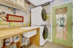 Laundry room is the perfect breezeway into the home 