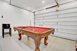 Amazing game room includes a smart TV and lounge area plus a selection of table games and board games