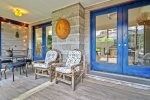 Off the other side of the open great room is this lovely screened patio 