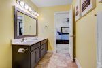 Primary bathroom with a shower and double vanity