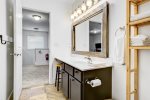 Guest bathroom with a shower tub combo 