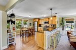 Looking into the kitchen and dining from the living 