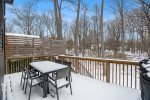 Sliders from the casual dining area lead to the upper deck with outdoor dining