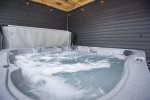 Ease your worries away as you soak in your private hot tub 