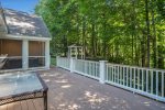 Spacious deck with outdoor dining just off the screen porch