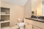 Full bathroom ensuite with a walk in shower 