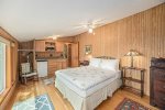 This space has a queen bed, kitchenette, and full views of Lake Michigan 