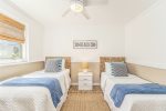 Guest bedroom with two twin beds 