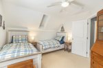 Upper level bedroom with two twin beds 