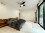 Primary bedroom on the main level has a king size bed