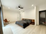 Spacious primary bedroom with a king bed 
